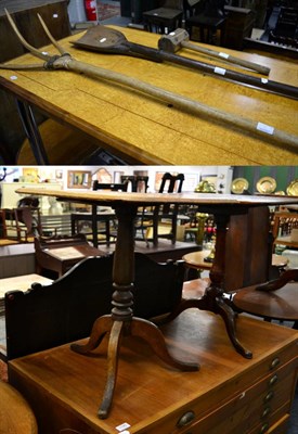 Lot 1194 - ^ Two George III oak tripod tables, one with a tilt top; and three vintage tools