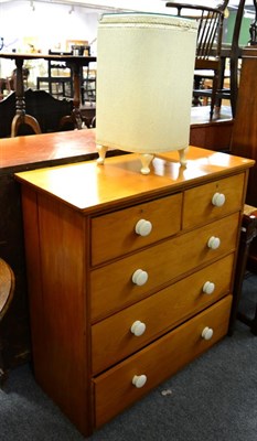 Lot 1202 - A Victorian pine four height chest of drawers together with a wicker linen basket