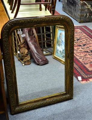 Lot 1215 - An oval brass mirror together with another