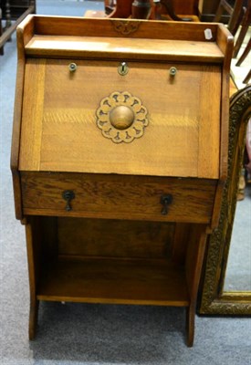 Lot 1216 - An oak hall bureau