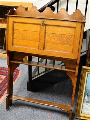 Lot 1224 - An oak wall mounted bureau