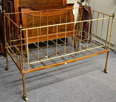 Lot 1226 - A 19th century painted metal crib