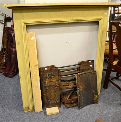 Lot 1228 - A painted carved wooden fire surround and a small group of fire insert elements