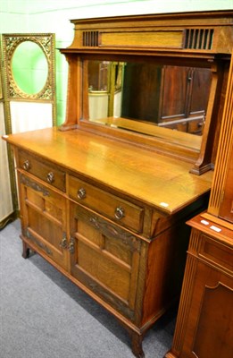 Lot 1258 - An oak Arts & Crafts sideboard in the manner of Liberty, the drawers with stamped registration...