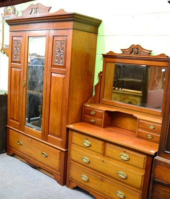 Lot 1261 - A two piece Edwardian bedroom suite comprising of a wardrobe and a dressing table