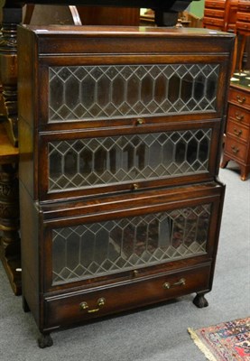 Lot 1266 - A three tier leaded stacking bookcase