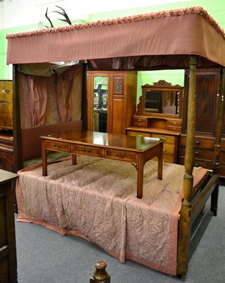 Lot 1270 - An oak four-poster bed, 19th century, with turned front posts supporting a red silk paisley...