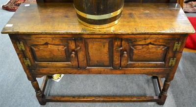 Lot 1283 - A reproduction oak side cabinet in 17th century style