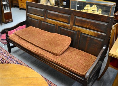 Lot 1287 - ^ A 19th century four panel oak settle