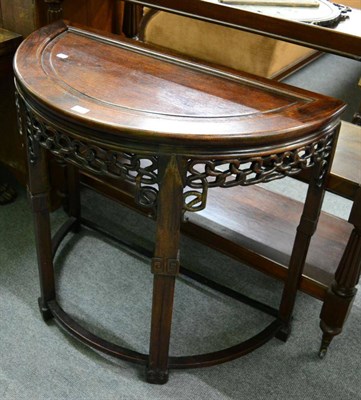 Lot 1293 - A Chinese style demi lune hall table