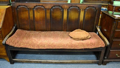 Lot 1303 - ^ A 19th century oak five panelled settle