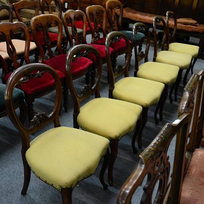 Lot 1310 - A set of six Victorian rosewood balloon back dining chairs