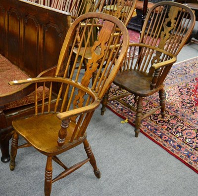 Lot 1325 - ^ A matched pair of oak and elm Windsor armchairs