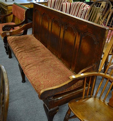 Lot 1327 - ^ A 19th century oak five panelled settle