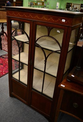 Lot 1343 - An Edwardian display cabinet