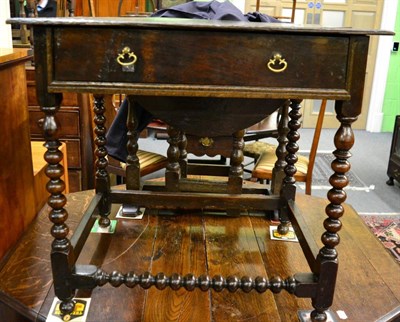 Lot 1344 - A bobbin oak table