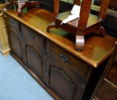 Lot 1361 - An oak sideboard