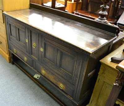 Lot 1367 - An oak mid 20th century sideboard