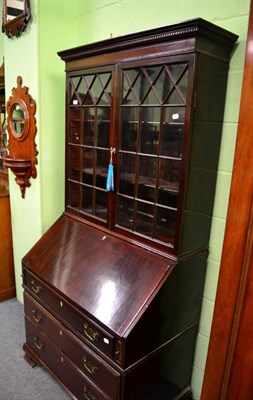 Lot 1373 - A mahogany bureau bookcase