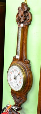 Lot 1384 - A 20th century oak barometer