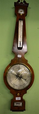 Lot 1388 - A Victorian mahogany wheel barometer, spirit level dial signed