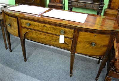 Lot 1393 - A Regency mahogany bowfront sideboard, single frieze drawer flanked by cellarette drawer and...