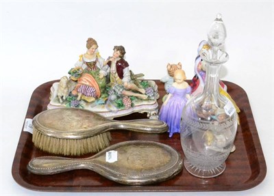 Lot 18 - Tray including china figures, silver backed brush and mirror, etched glass decanter