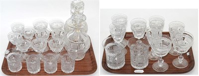 Lot 24 - An early 20th century set of table glassware, six settings and two decanters