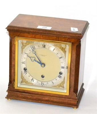 Lot 29 - An Elliott Westminster & Whittington chiming mantel clock in a burr walnut case