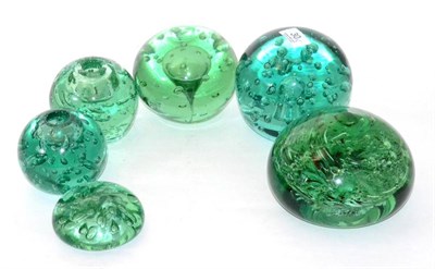 Lot 30 - Six Victorian glass dumps with bubble inclusions