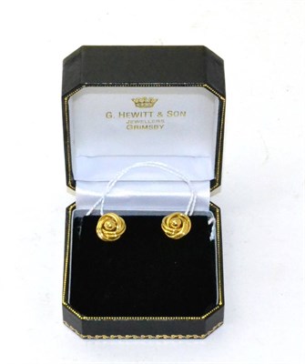 Lot 64 - A pair of 18ct gold knot earrings