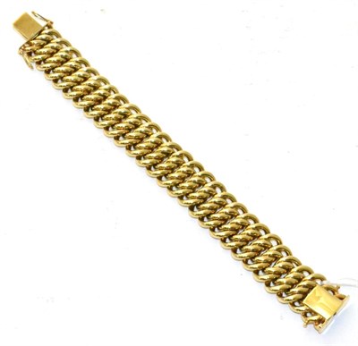 Lot 67 - A fancy link bracelet, stamped '585'