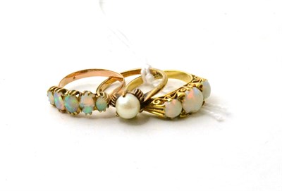 Lot 71 - An opal three stone ring, size 01/2, stamped '18K' (chipped) another opal ring (chipped) and a...