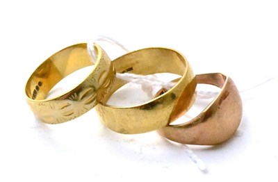 Lot 93 - Two 9ct gold band rings and a 9ct gold signet ring (3)