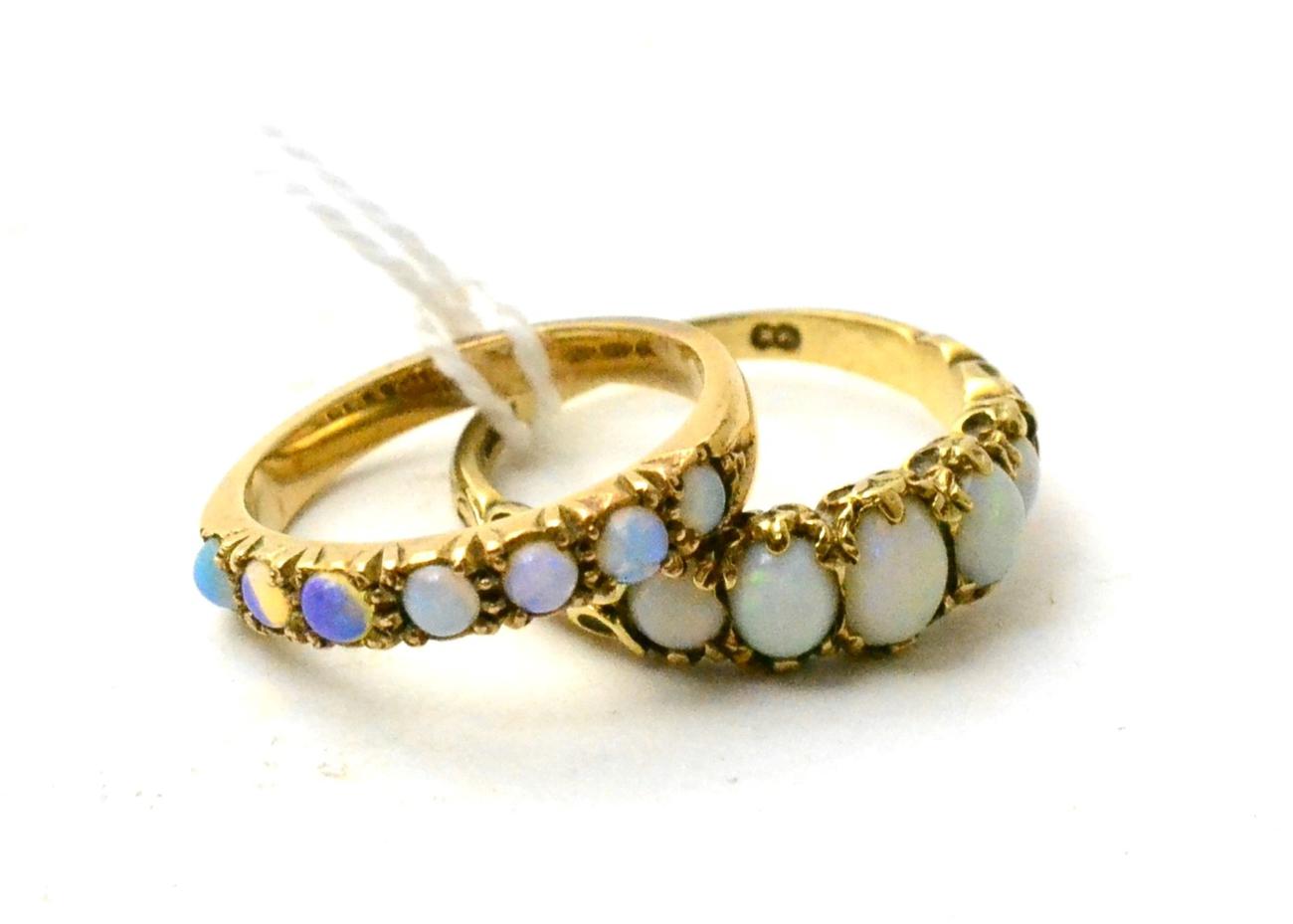 Lot 110 - A 9ct gold opal ring, size O and another opal ring (2)