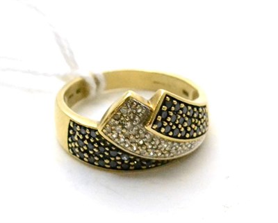 Lot 115 - A 9ct gold black and white diamond ring, finger size R1/2
