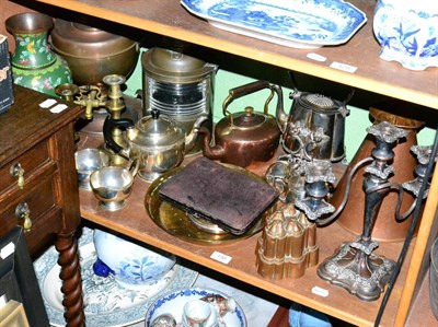 Lot 130 - A shelf of assorted metalwares including copper jelly moulds