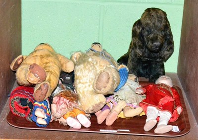 Lot 134 - Two straw filled teddy bears, assorted dolls and a straw filled dog