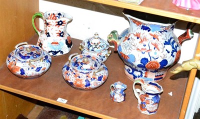 Lot 147 - A collection of Victorian ironstone china including a large ewer and a pair of pot pourri jars...