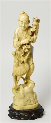 Lot 171 - A Japanese ivory okimono, Meiji period, late 19th/early 20th century, 23cm high
