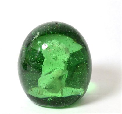 Lot 172 - A Victorian green glass dump with sulphide of a King Charles spaniel