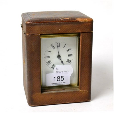 Lot 185 - A French brass carriage clock in travel case