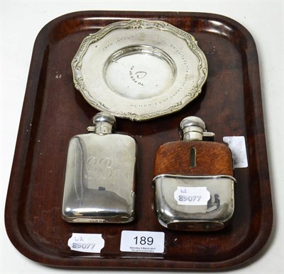 Lot 189 - Silver hip flask, monogrammed GB; another silver plated hip flask; and a plated dish from the...