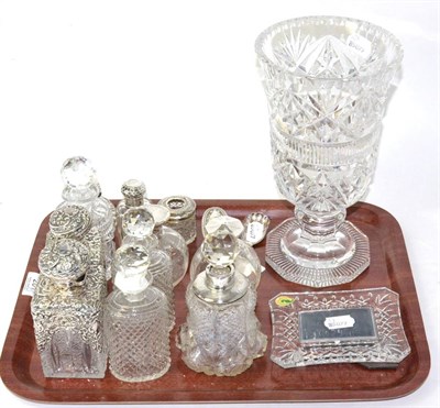 Lot 201 - Silver mounted glass bottles, a silver caddy spoon, a cut glass vase, Waterford crystal picture...