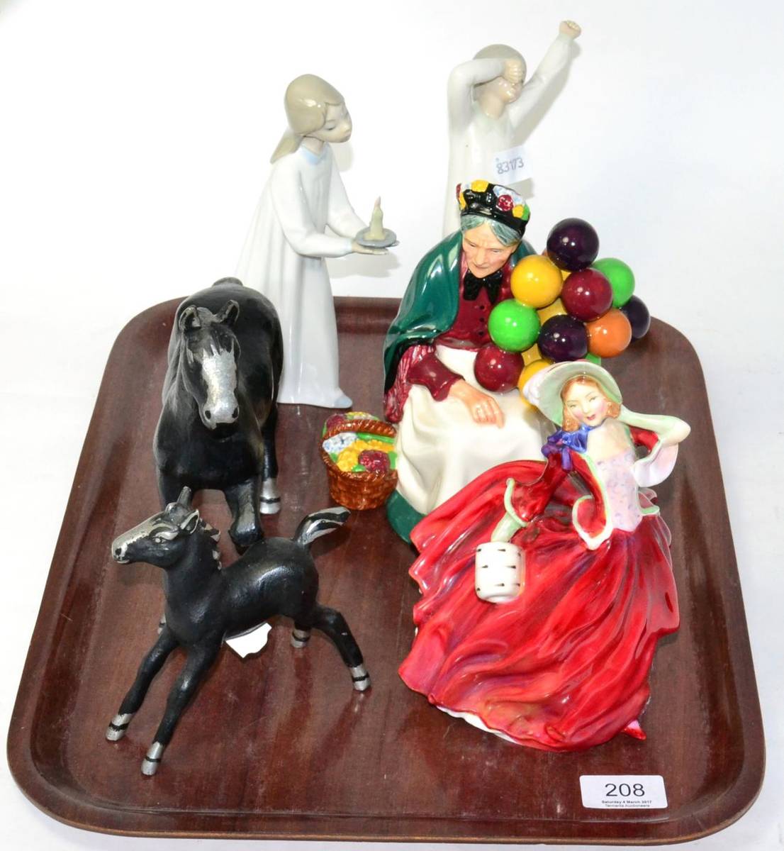Lot 208 - A Royal Doulton 'The Old Balloon Seller' figure HN1315; together with a Royal Doulton Autumn...
