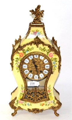 Lot 238 - A floral painted mantel clock