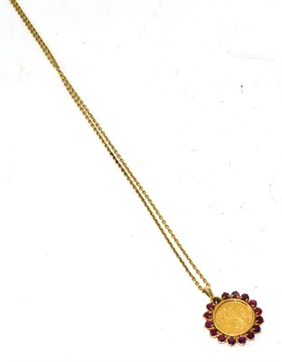 Lot 276 - A Victorian 1893 sovereign loose mount in a 9ct gold ruby set frame as a pendant on chain