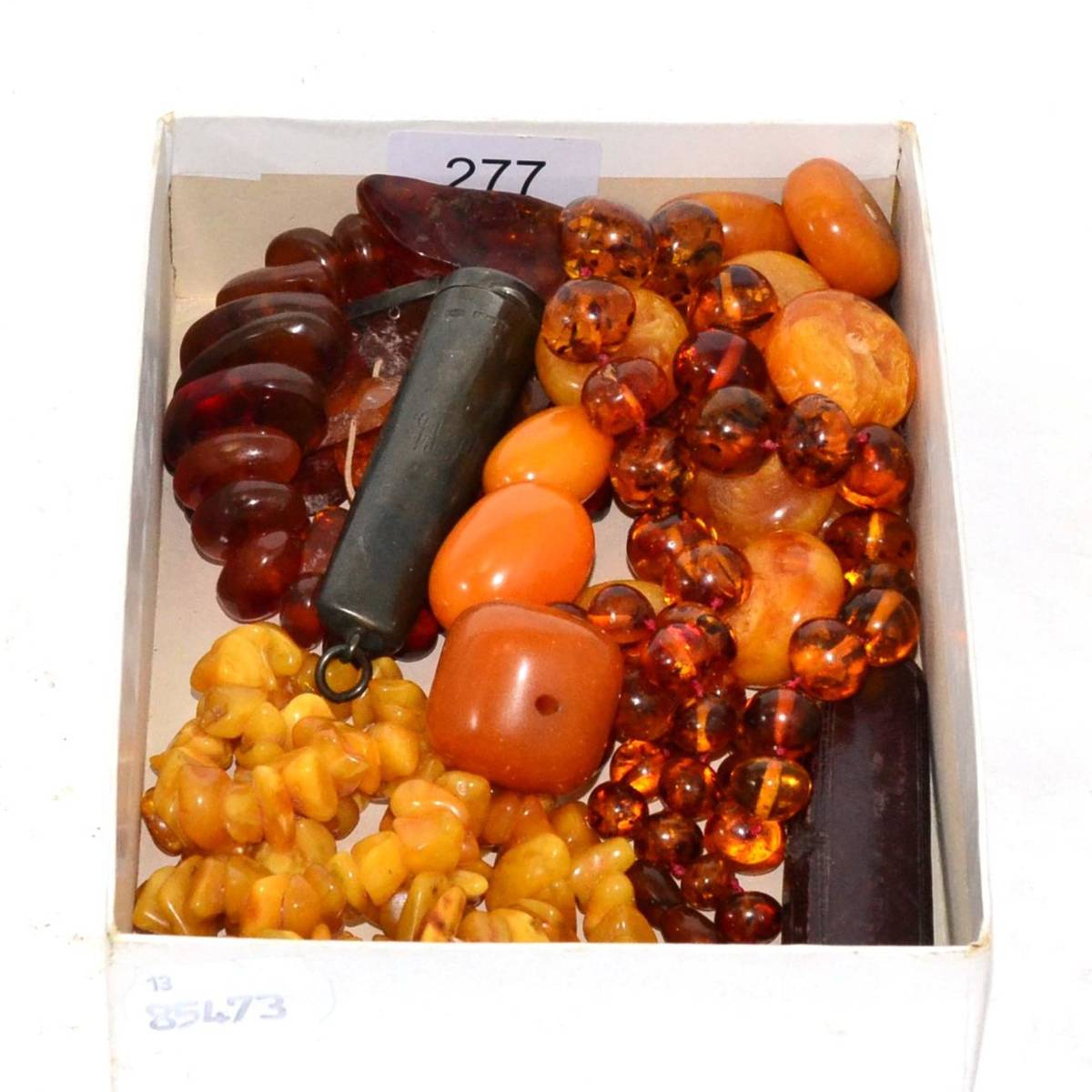 Lot 277 - A box of amber beads etc