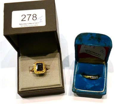 Lot 278 - A 9ct gold smoky quartz dress ring and a 9ct gold gem set ring