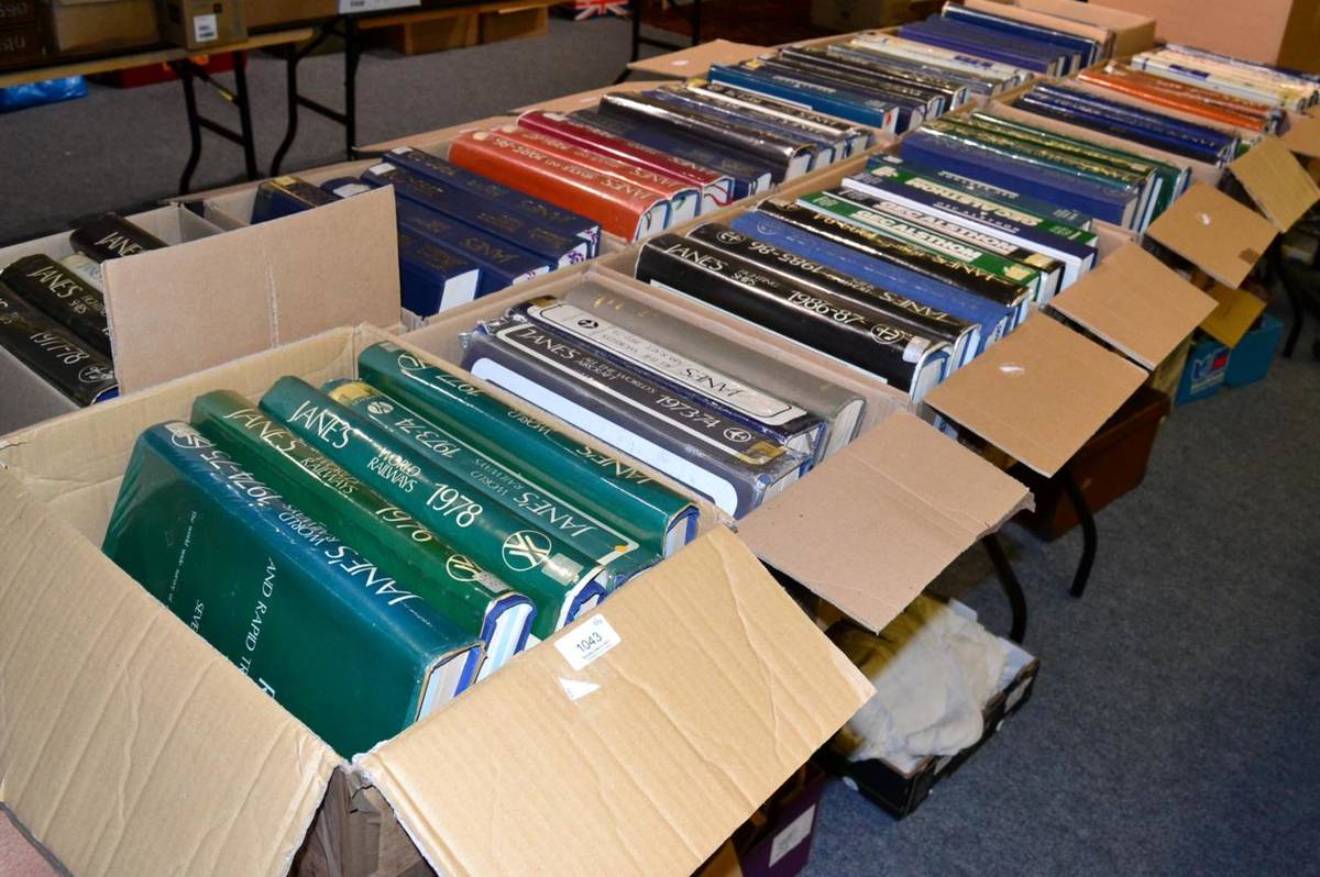Lot 1043 - Sixteen boxes of Jane's annuals: All The World's Aircraft, World Railways, Fighting Ships,...